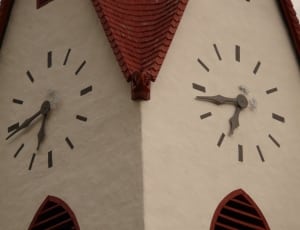 brown and white clock tower thumbnail