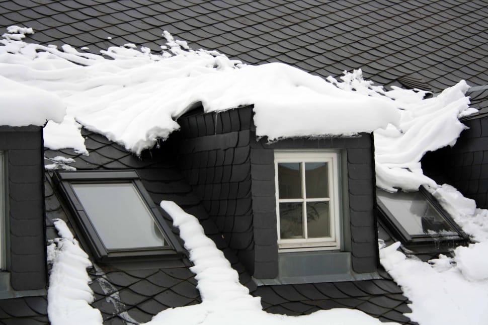 snow covered roof during daytime preview