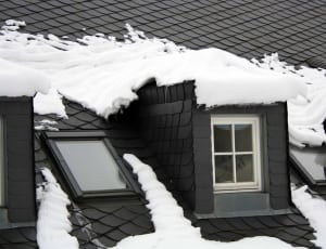 snow covered roof during daytime thumbnail