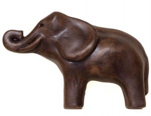 brown wooden elephant figurine thumbnail