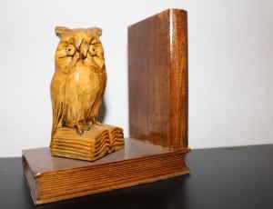 brown wooden owl figurine thumbnail