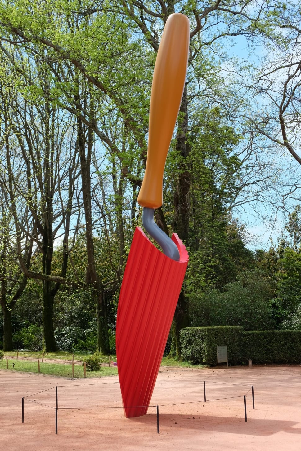 brown handled red hand shovel statue preview