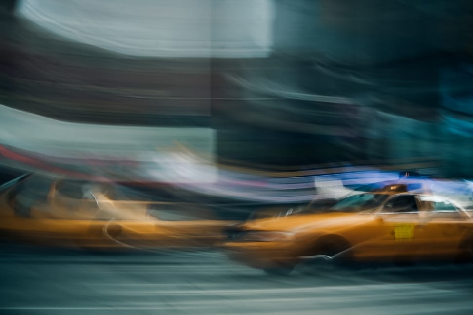 orange taxi cab on the road preview