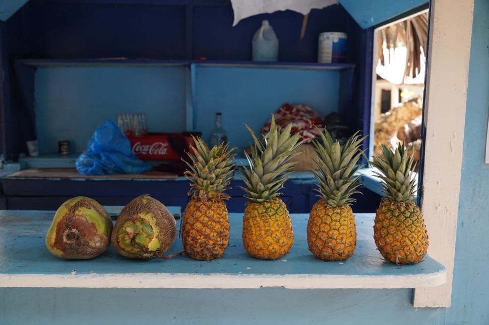 four Pineapple fruits and two coconuts preview