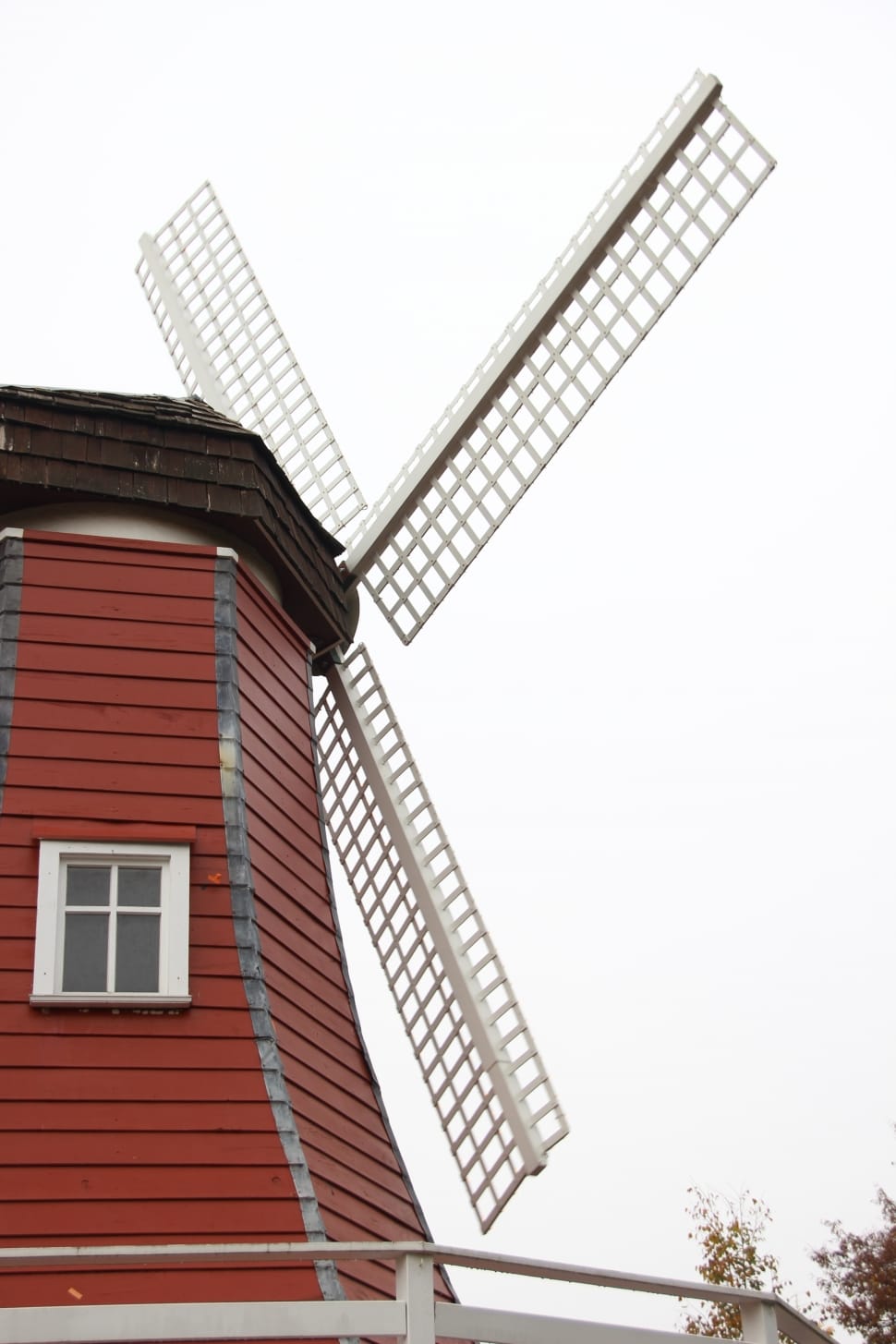 white and brown wooden windmill preview