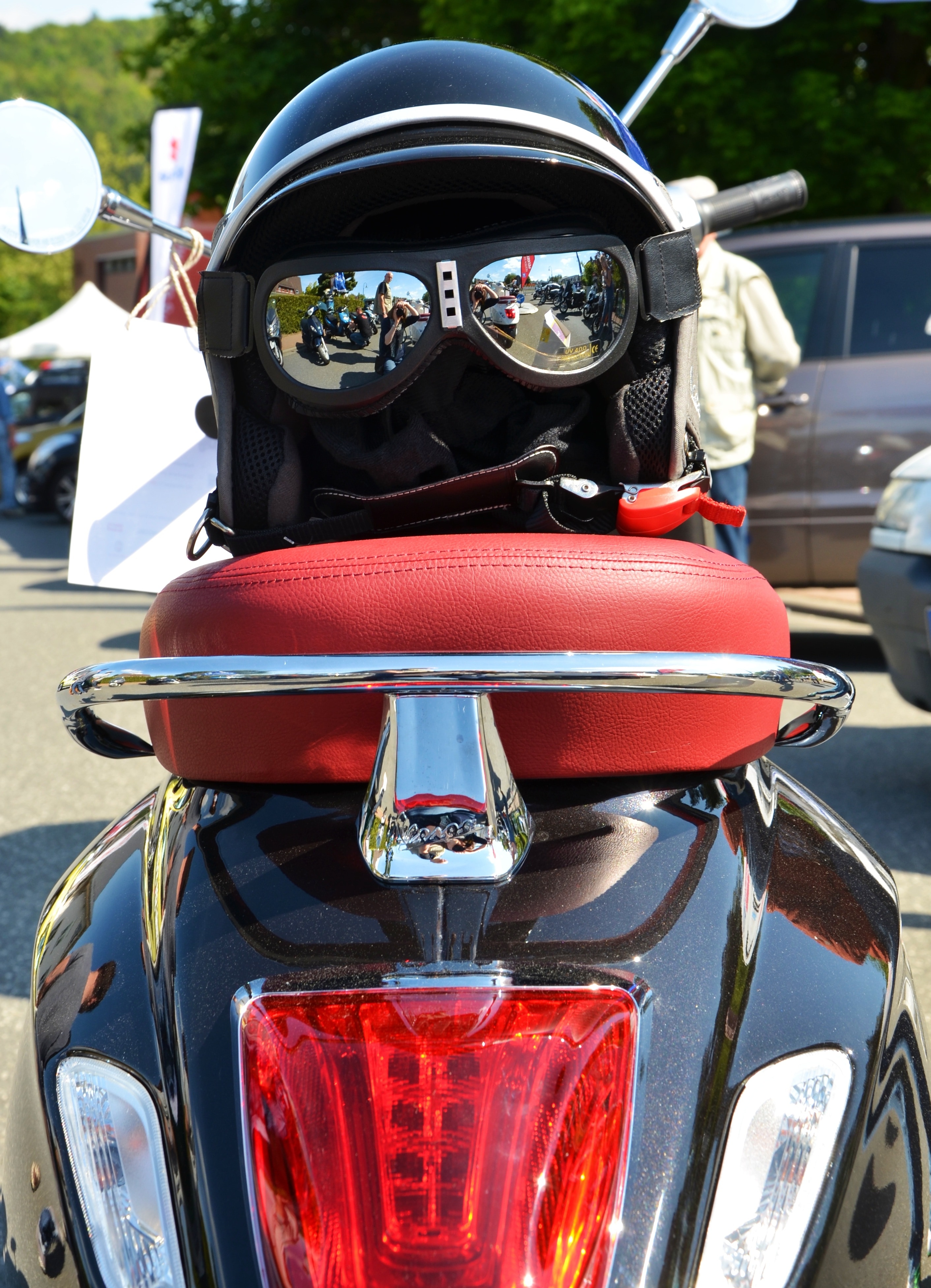black motorcycle helmet and goggles