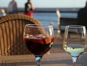 red liquid filled wine glass thumbnail