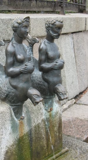 mermaid and merman statues thumbnail