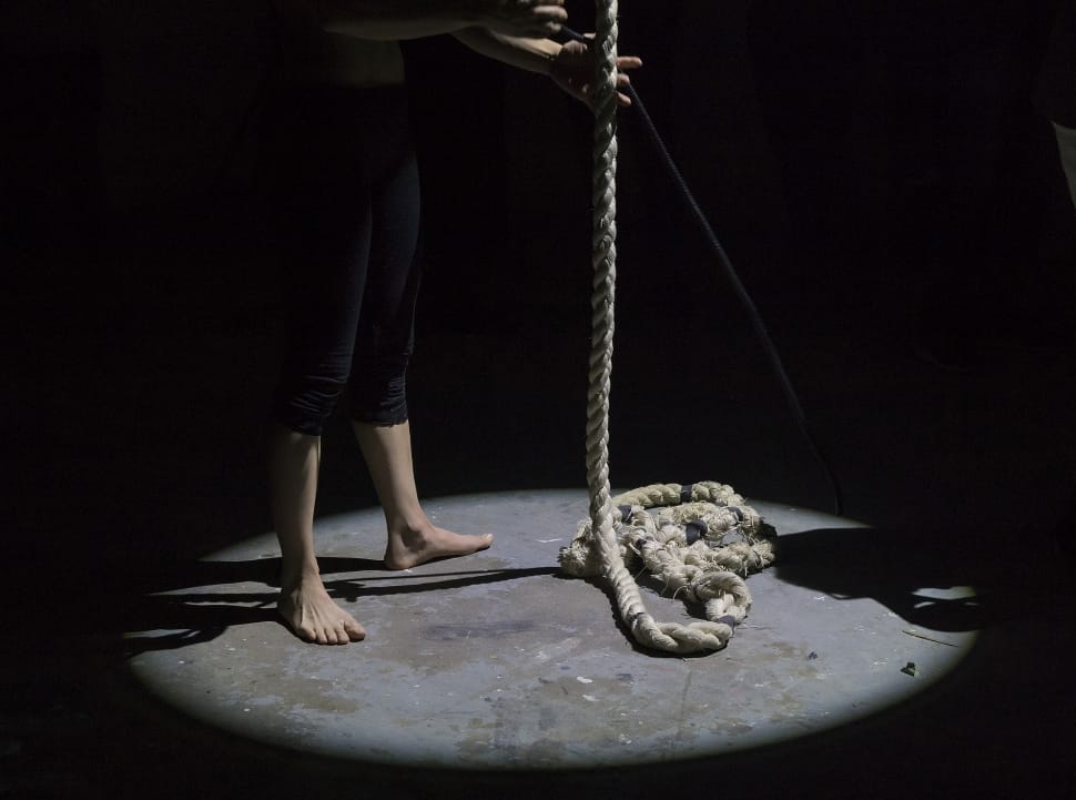 man holding white rope preview