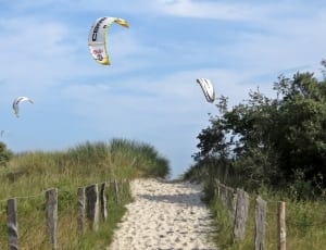 white paragliding equipment thumbnail
