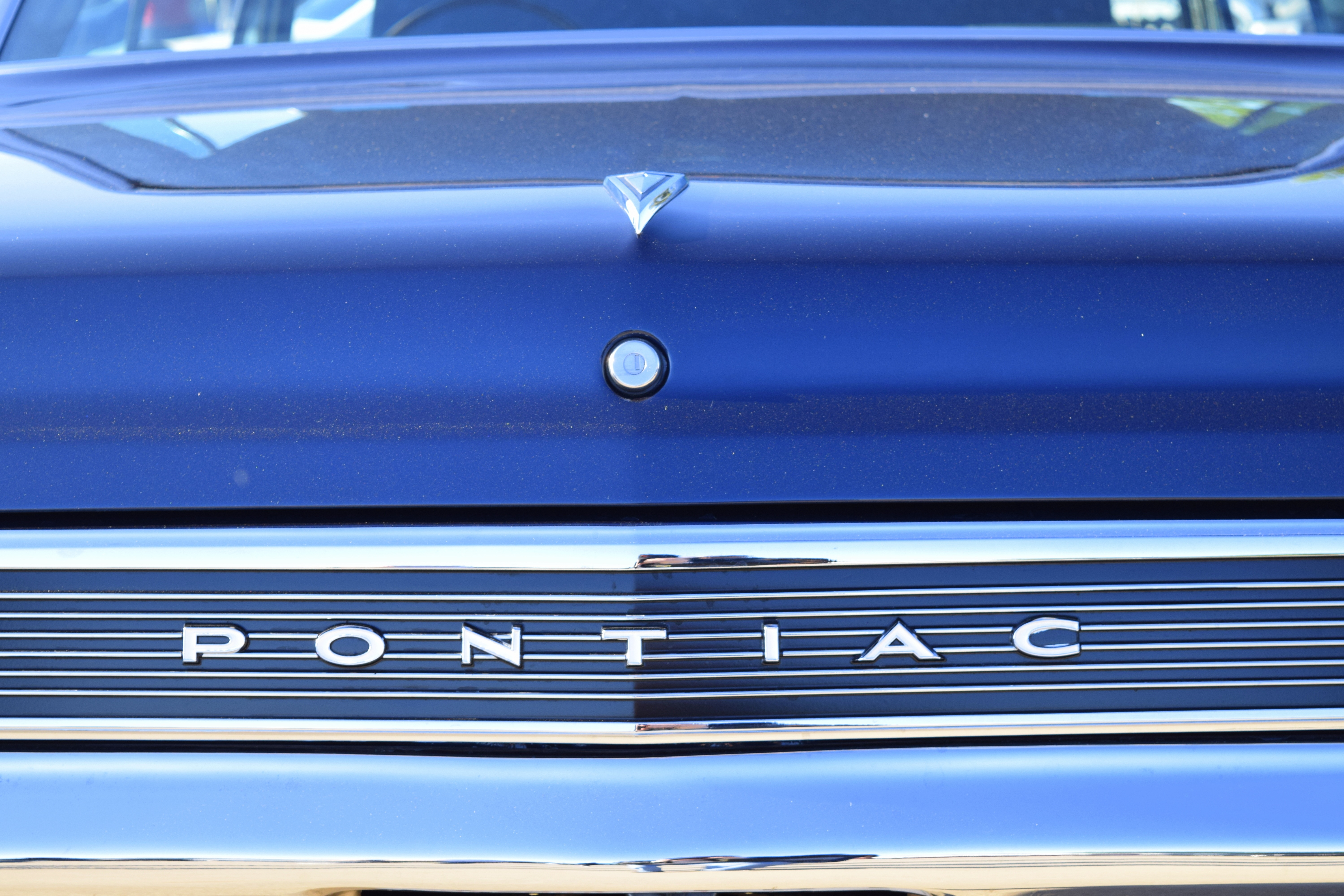 blue pontiac sedan