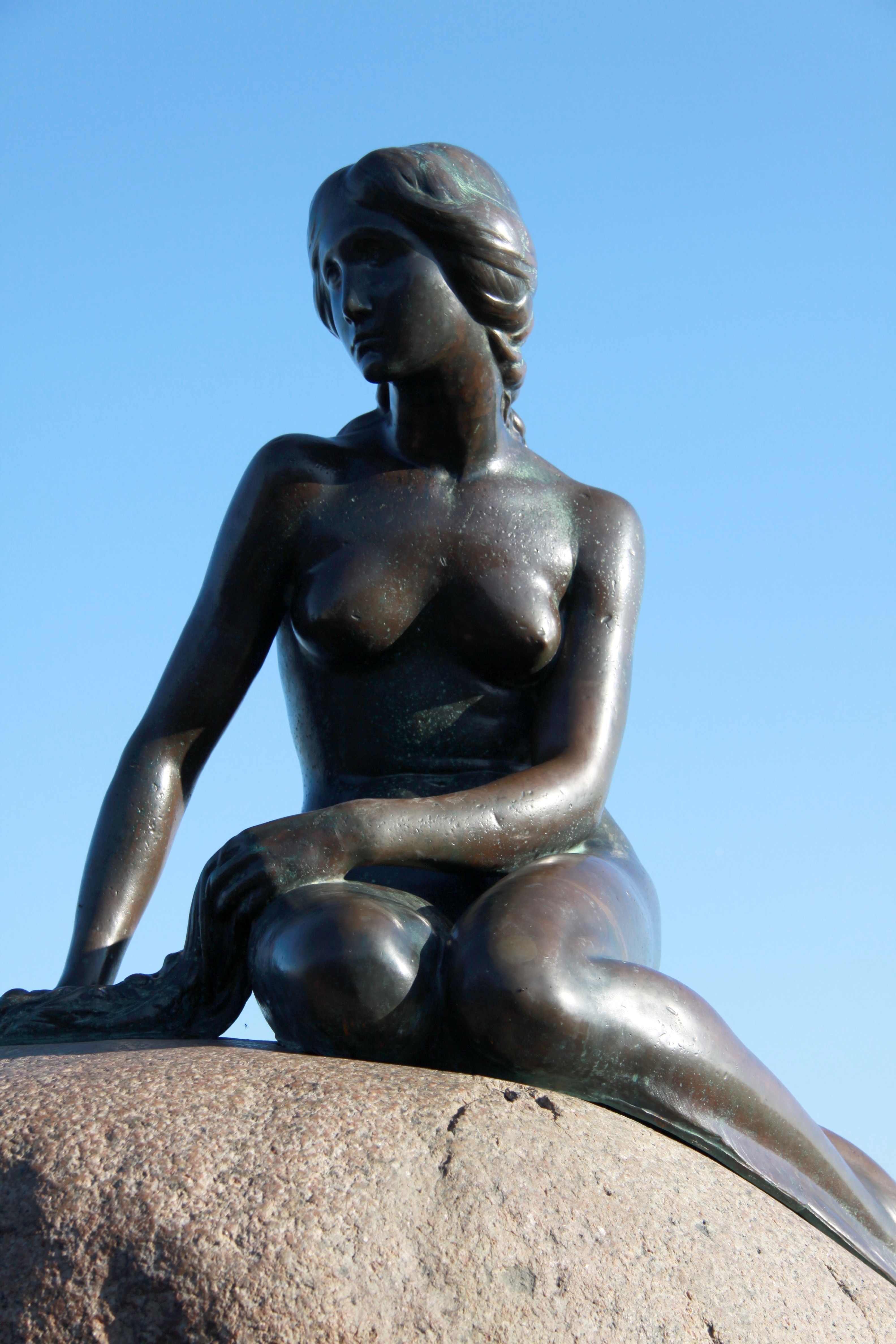 sitting naked woman figurine