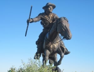 male riding horse holding weapon sculpture thumbnail