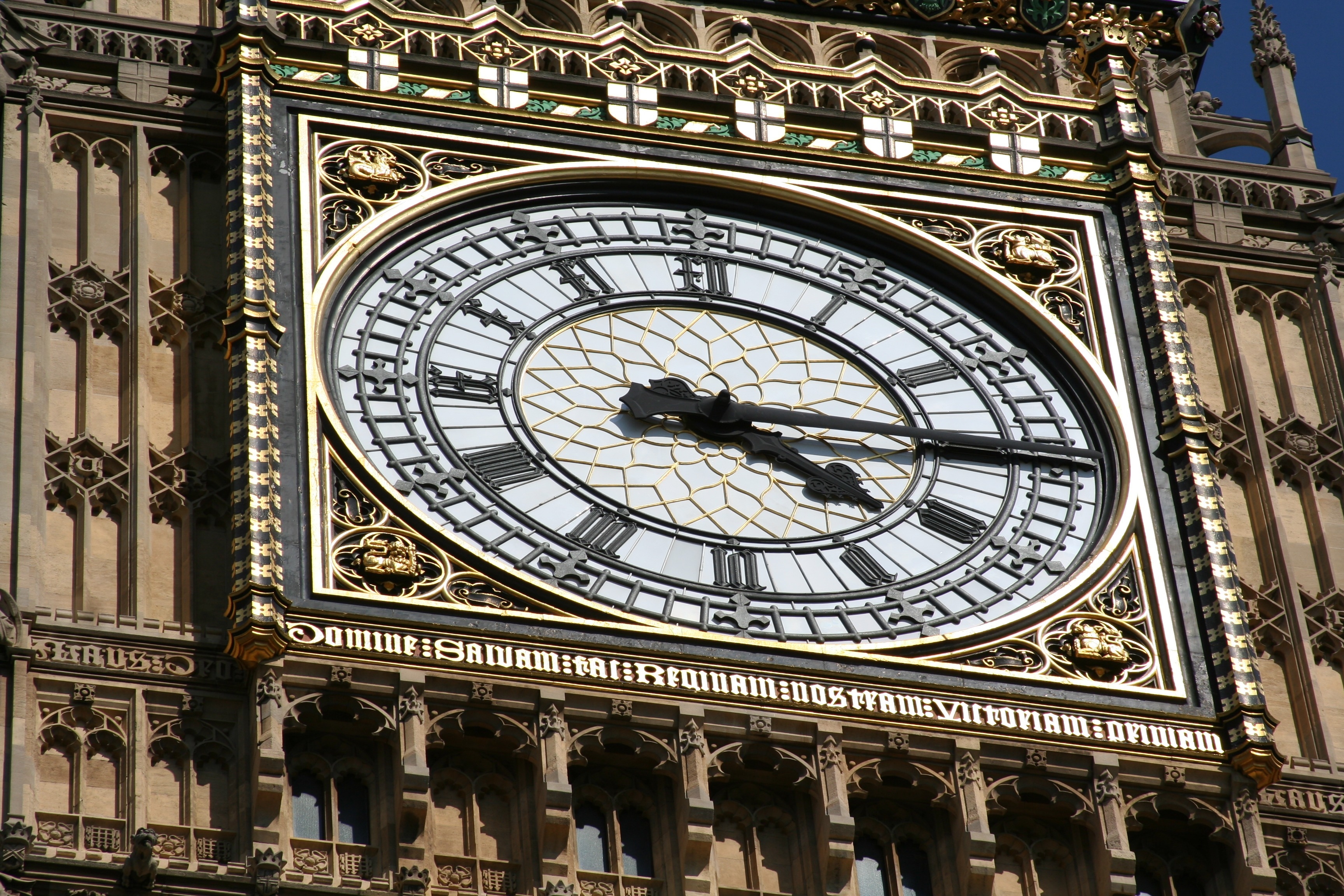 brown and white clock building