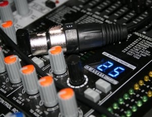 gray black and green audio mixer thumbnail