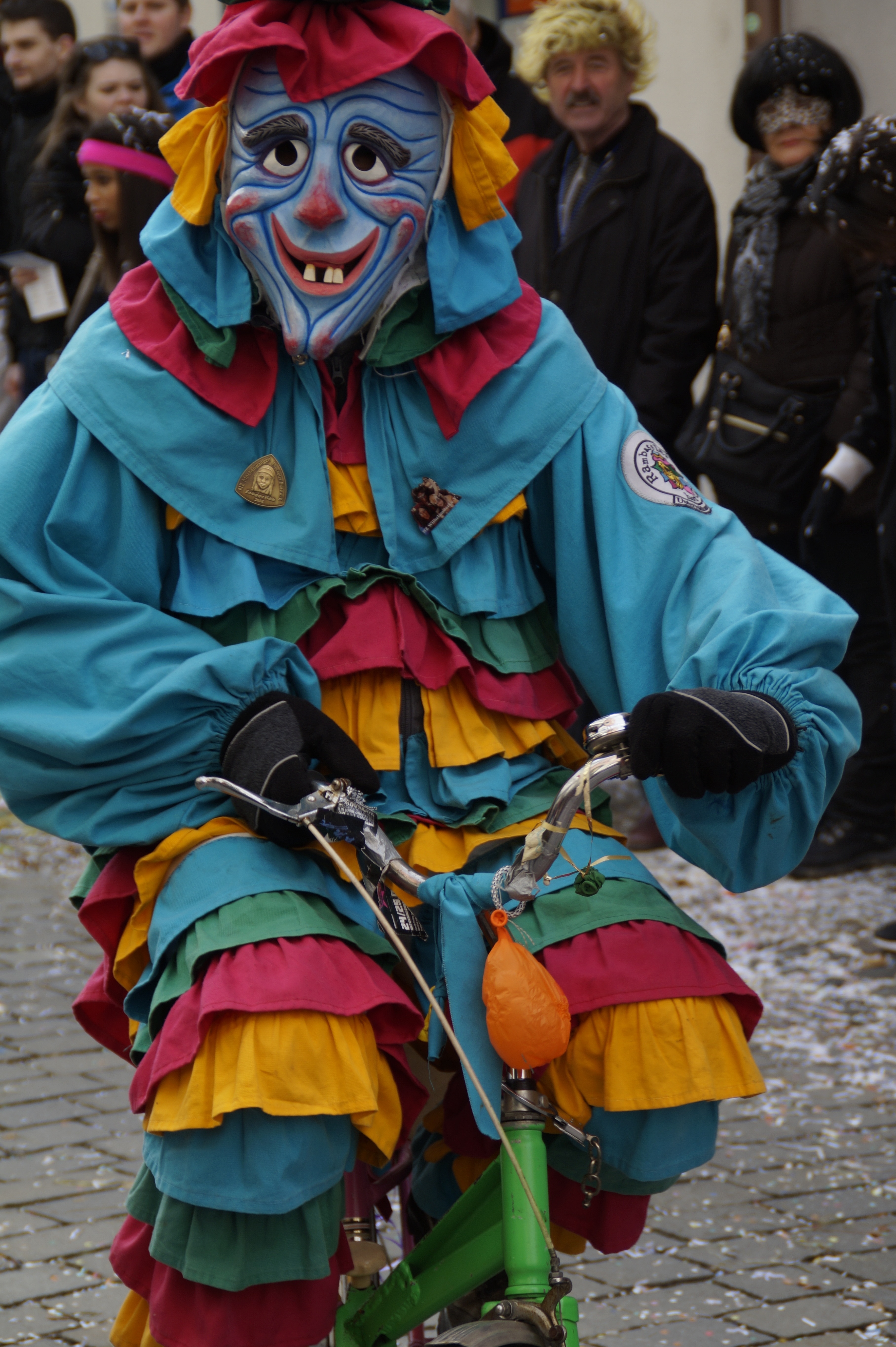 mascot in multicolored dress