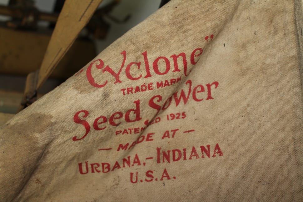 grey and red cyclone trade mark seed sower sack preview