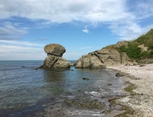 rock formation along shoreline thumbnail