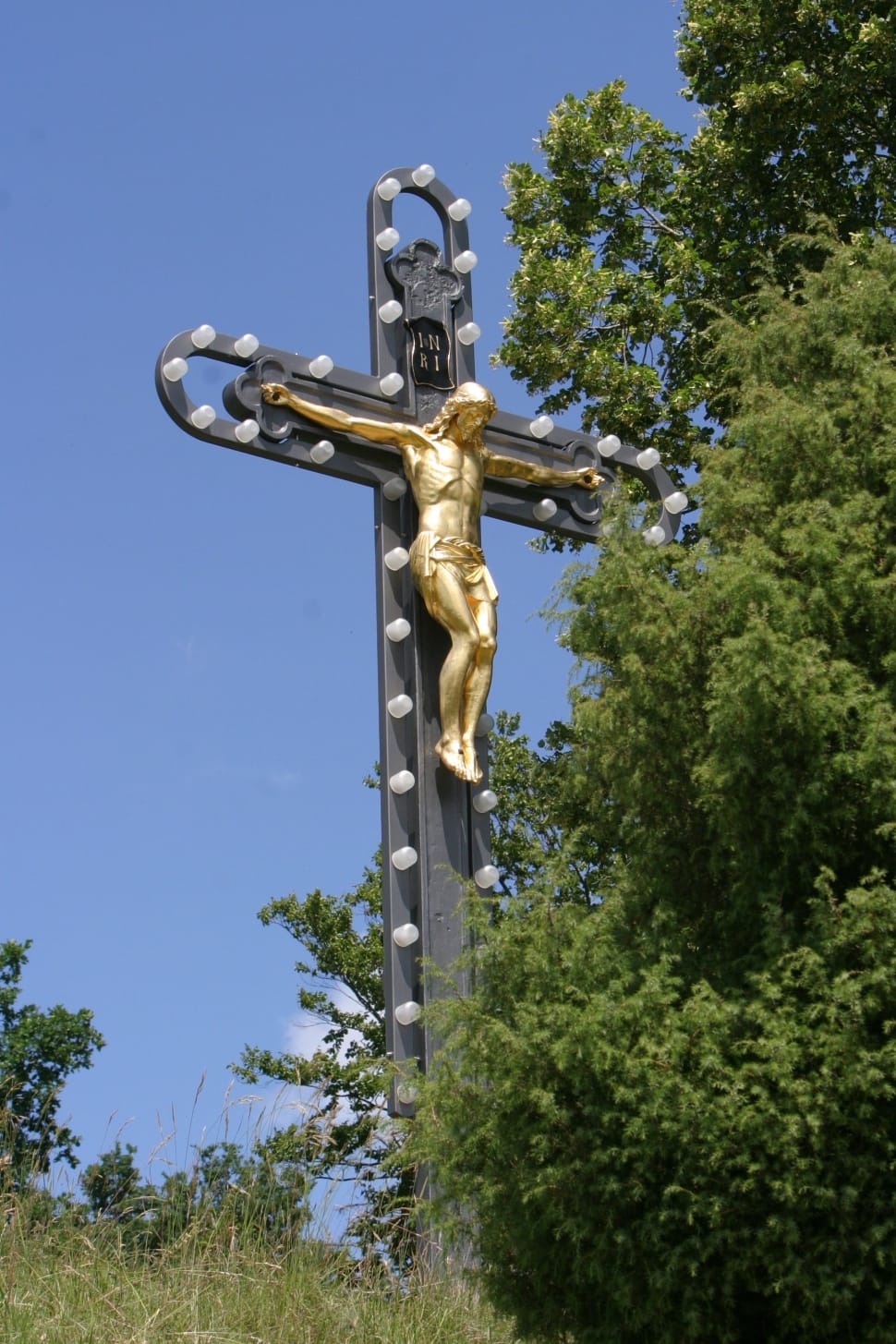 gold and gray crucifix statue preview