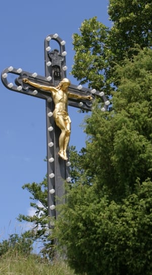 gold and gray crucifix statue thumbnail