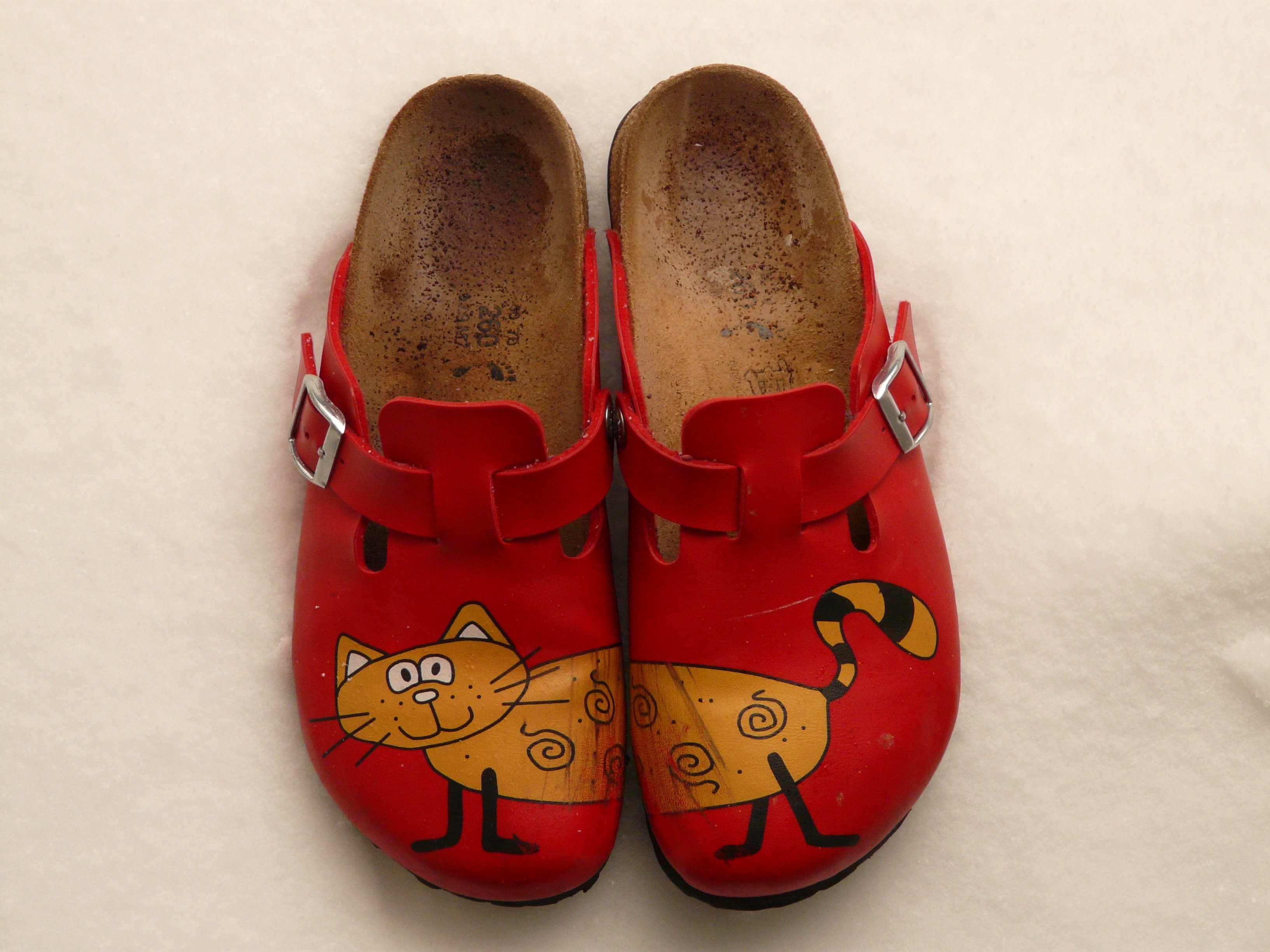 red brown and yellow cat print sandals
