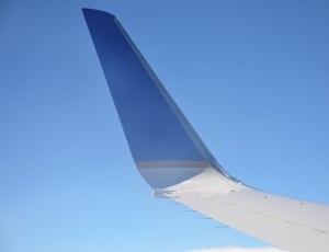 blue and white airplane thumbnail