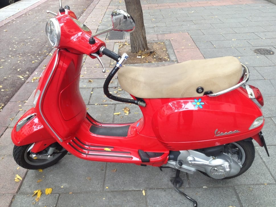 red vespa  park on the street preview