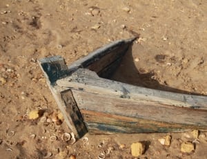 grey wooden sail boat thumbnail