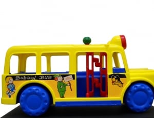 yellow and blue school bus toy thumbnail