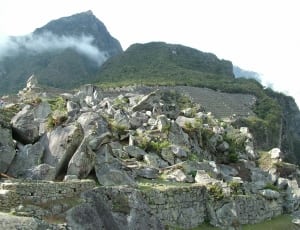 green mountain with gray rock formation thumbnail
