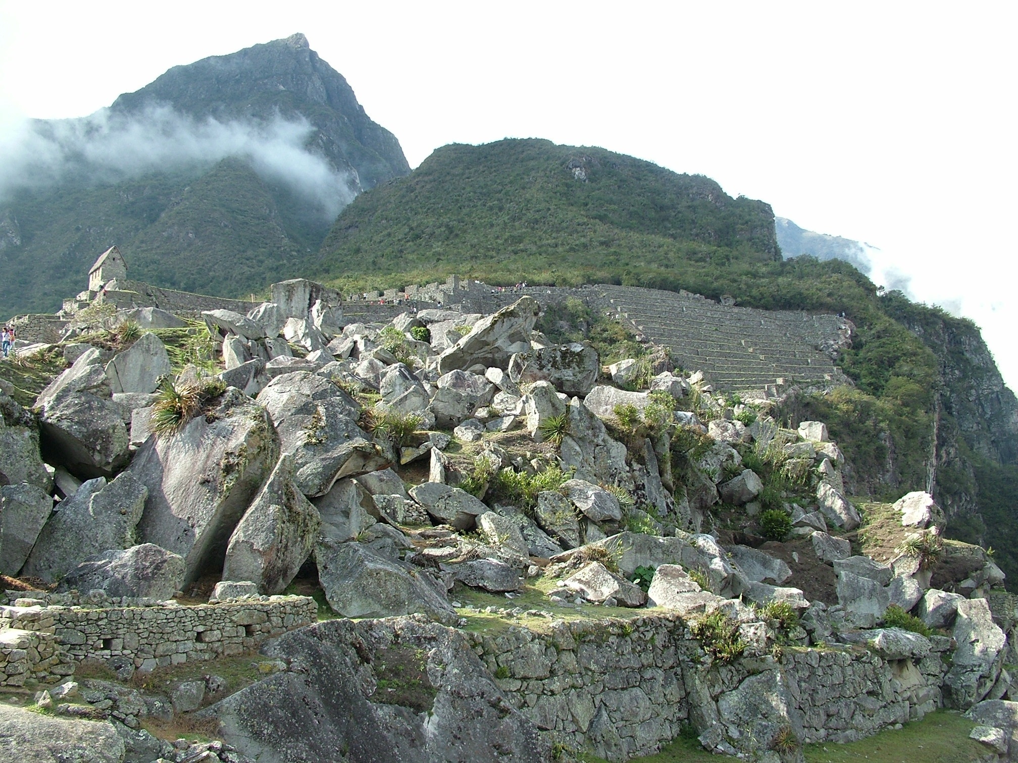 green mountain with gray rock formation