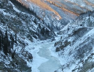 glacier mountain and river view covered with snow during daytime thumbnail