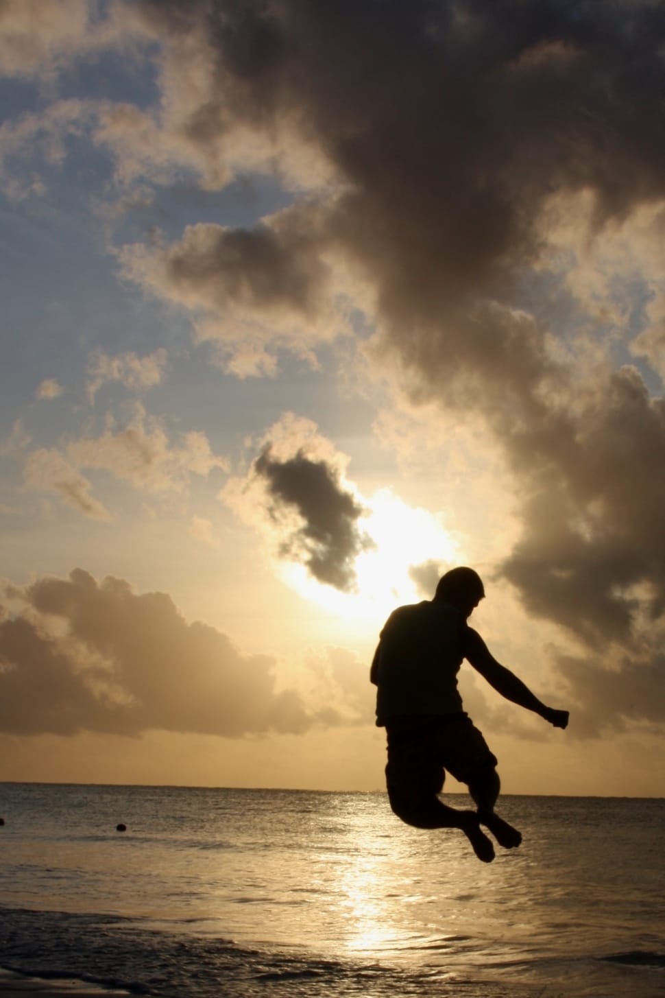 silhouette of leaping man on midair preview