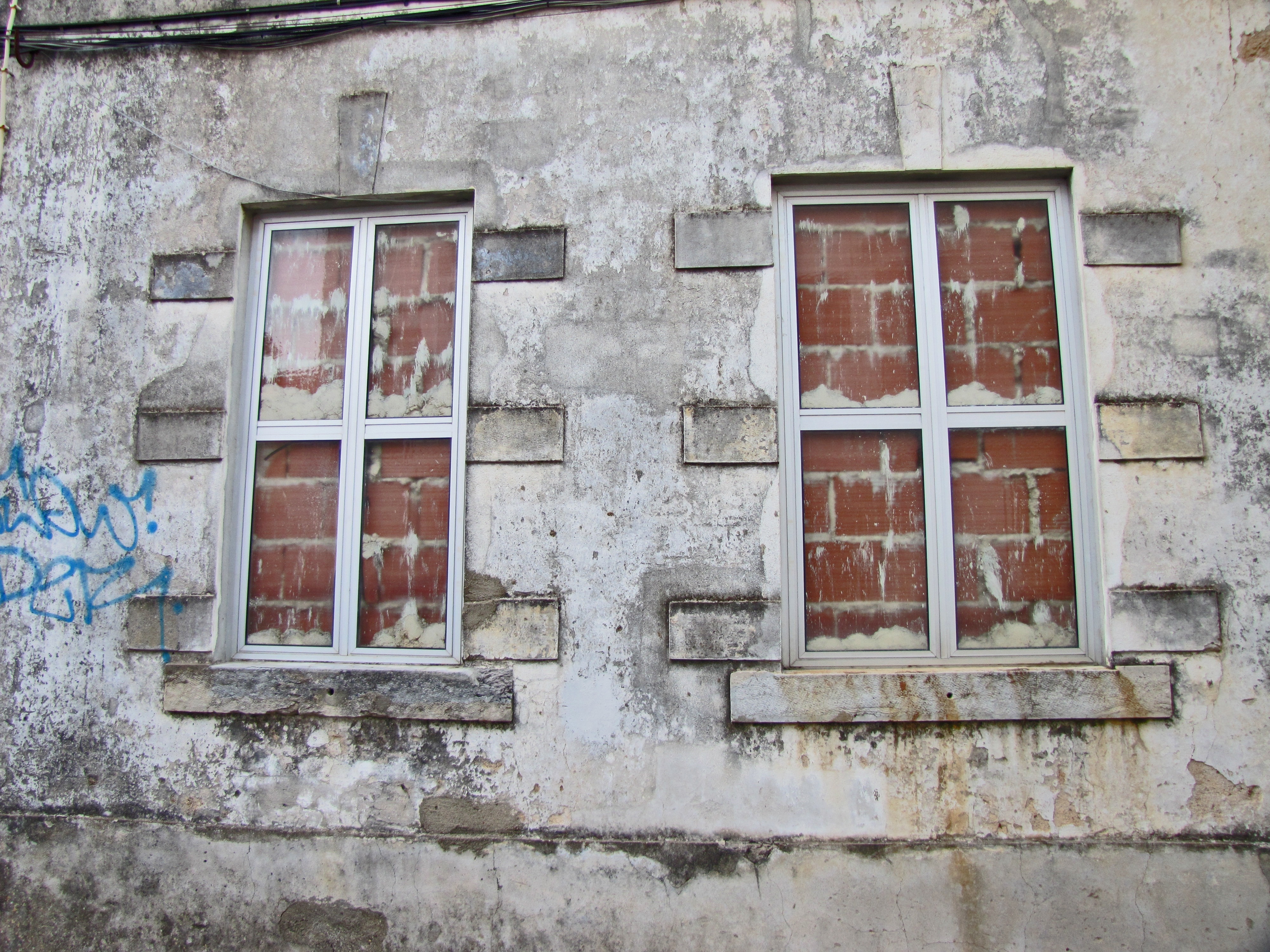 2 gray stainless steel window frames