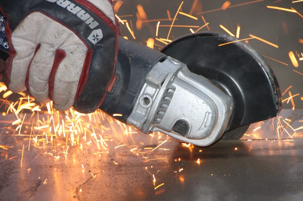 grey angle grinder cutting metal preview