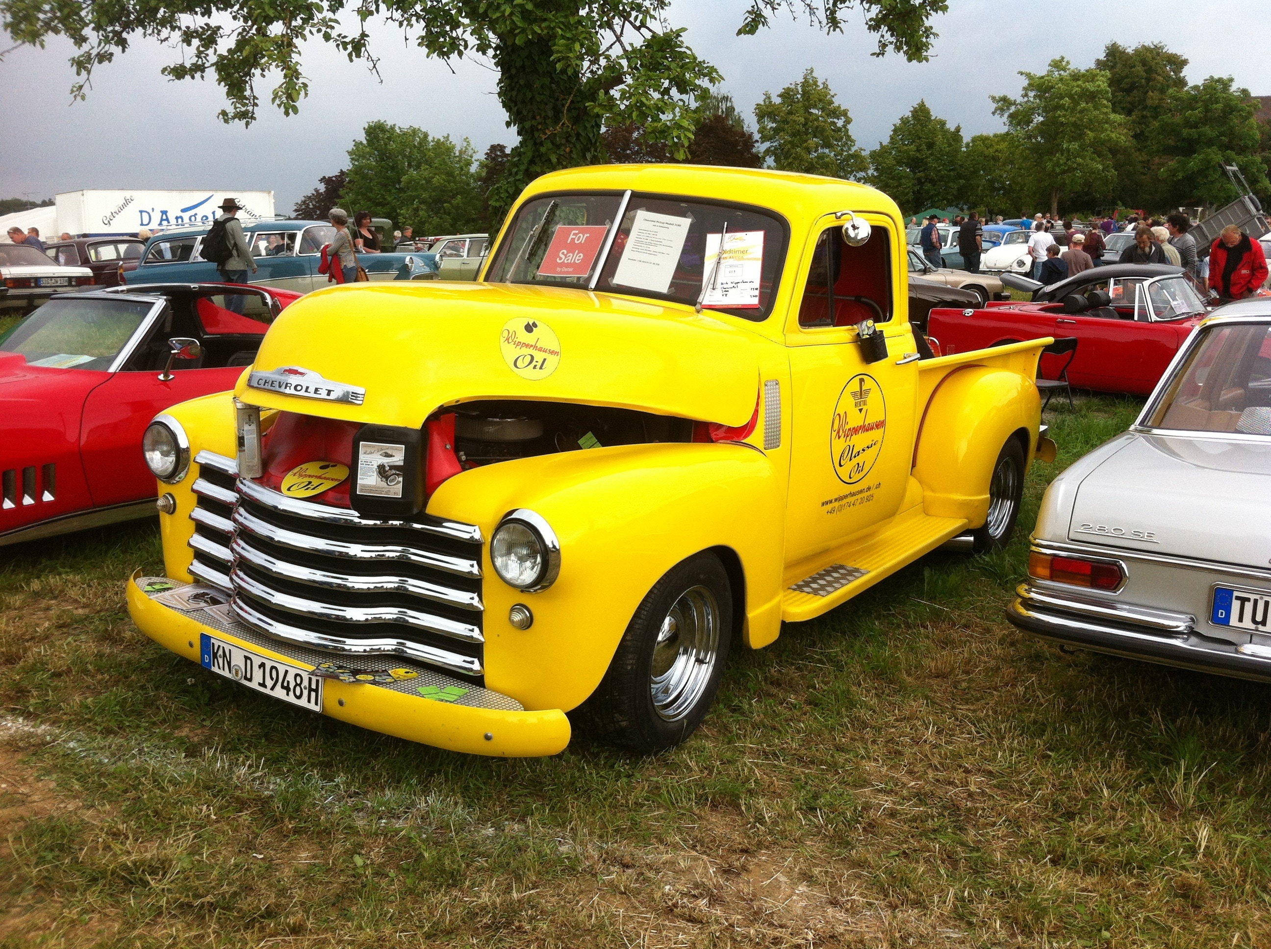 yellow single cab truck