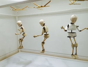 3 white and brown wooden string puppets thumbnail