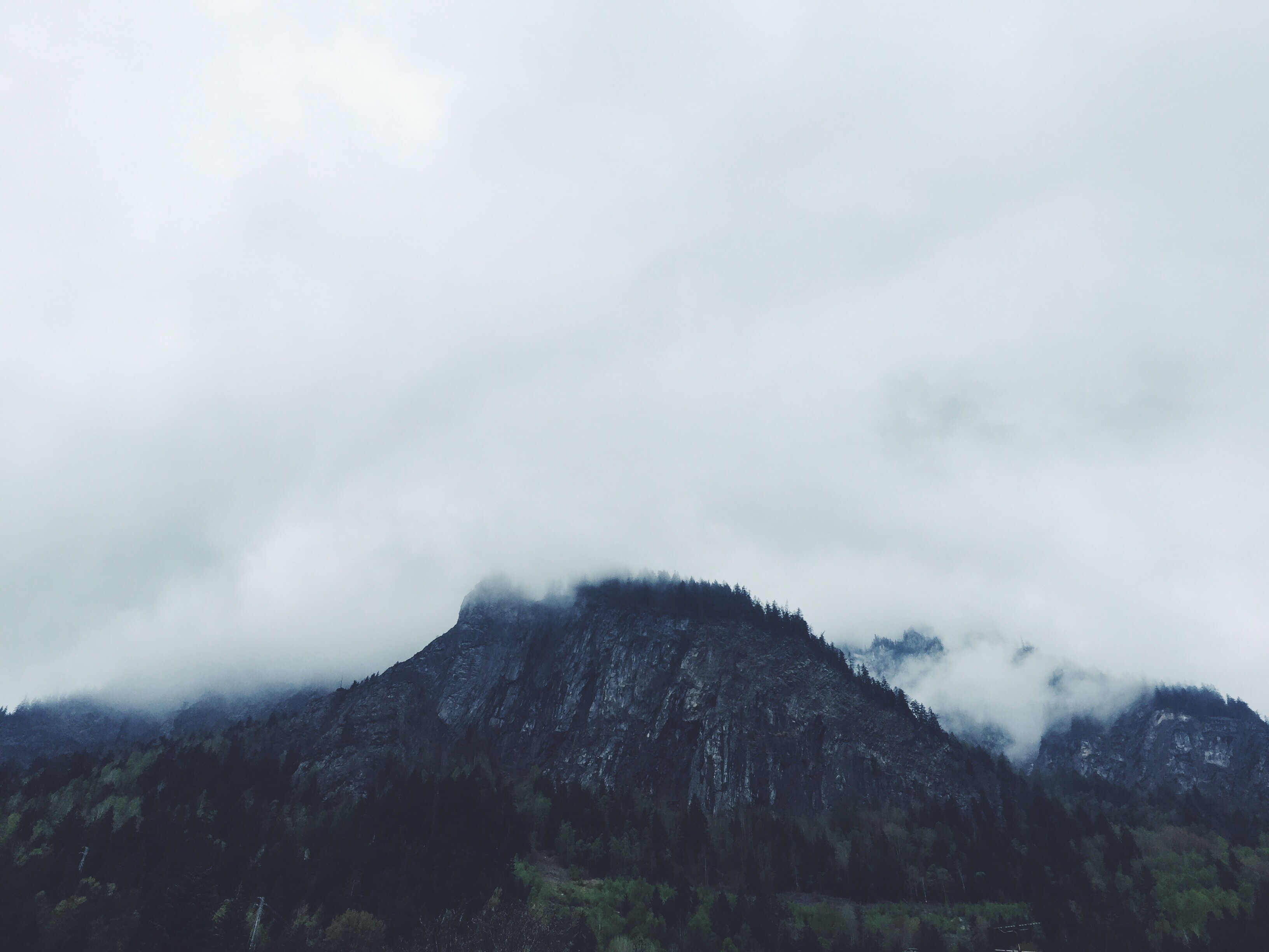 grey high rise mountain with clouds