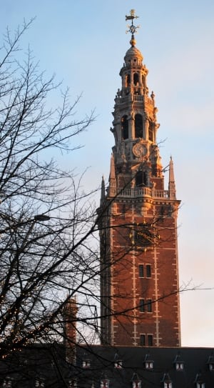 brown and gray concrete clock tower thumbnail