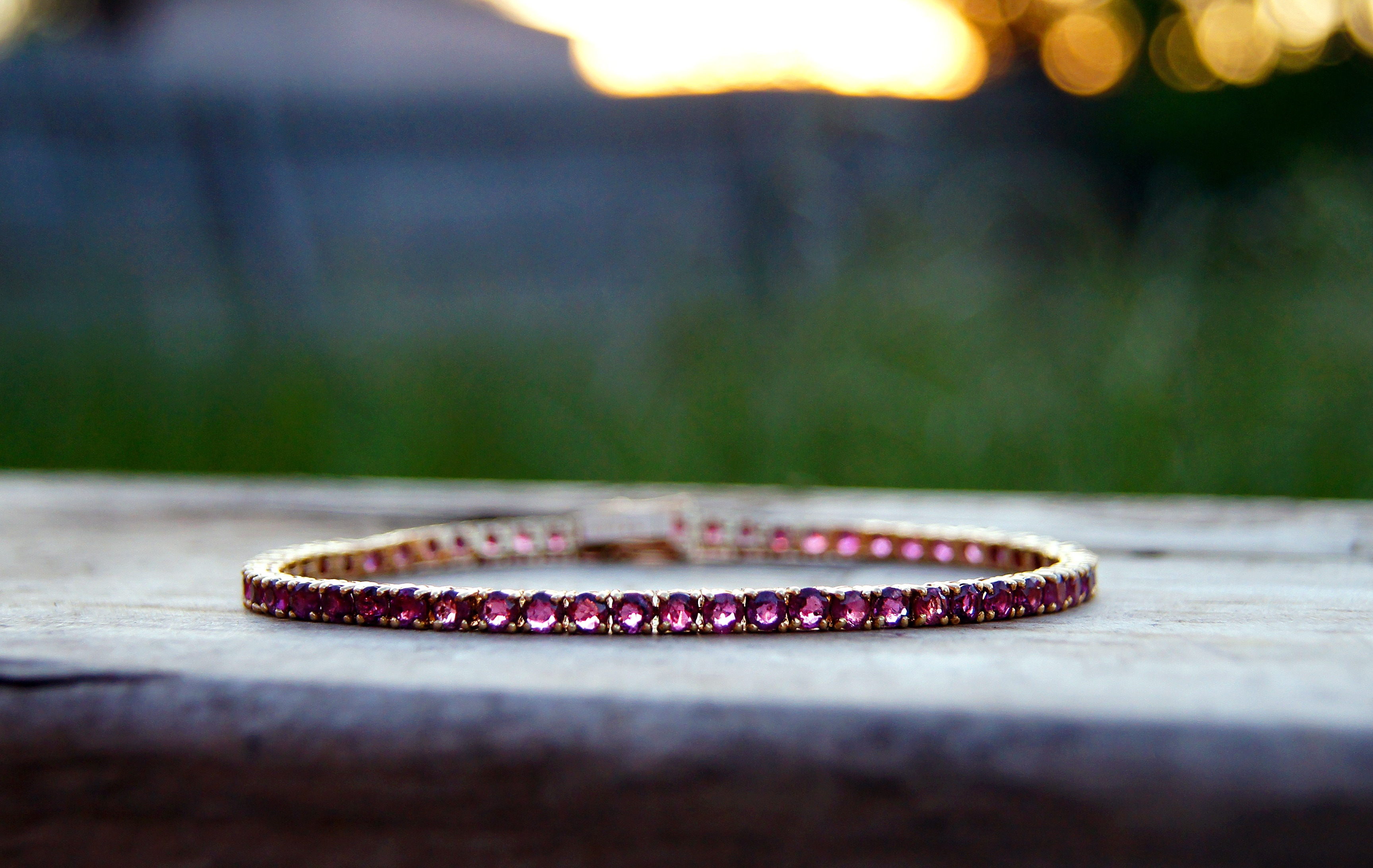 gold and purple gemstone bracelet