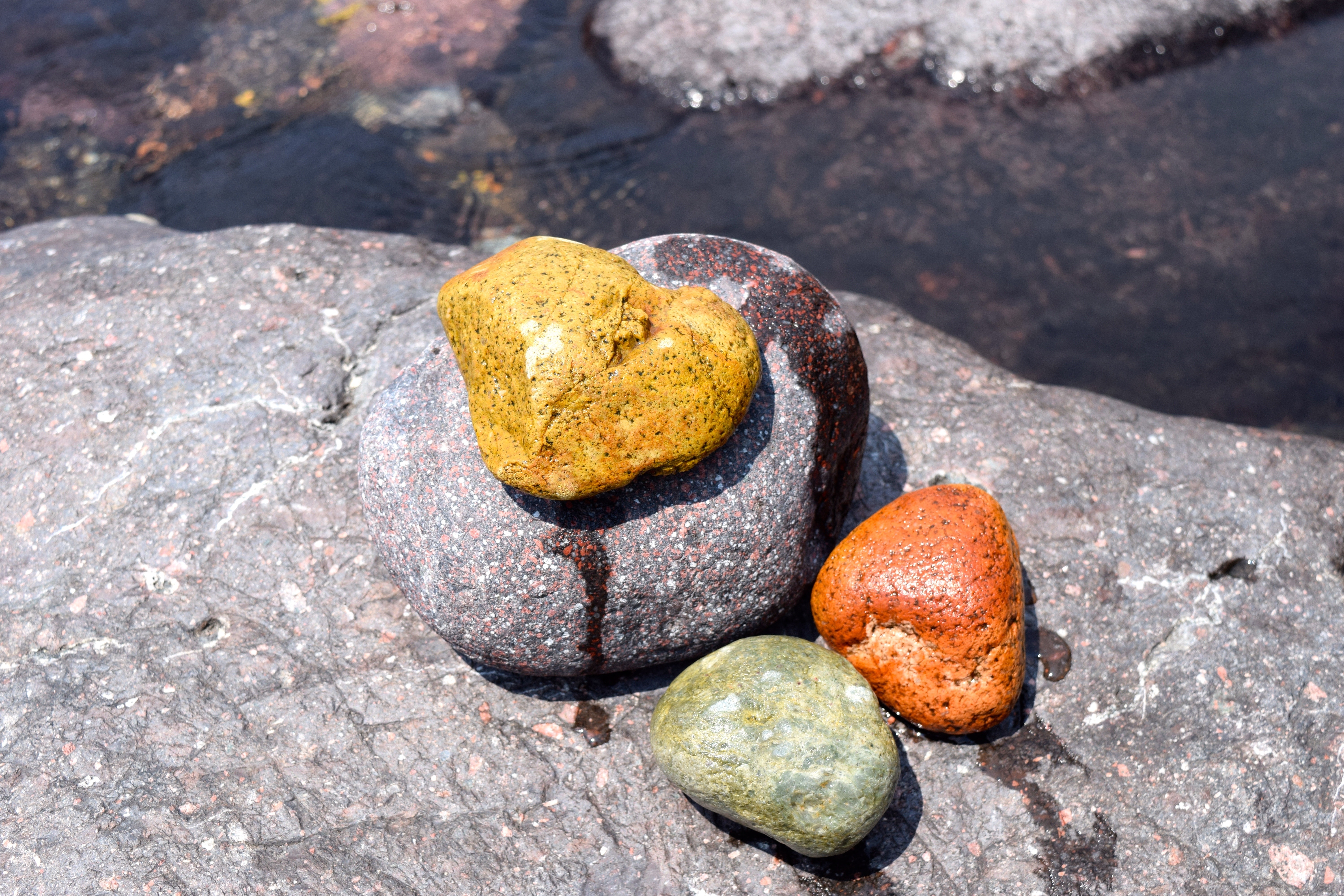 four colorful stones