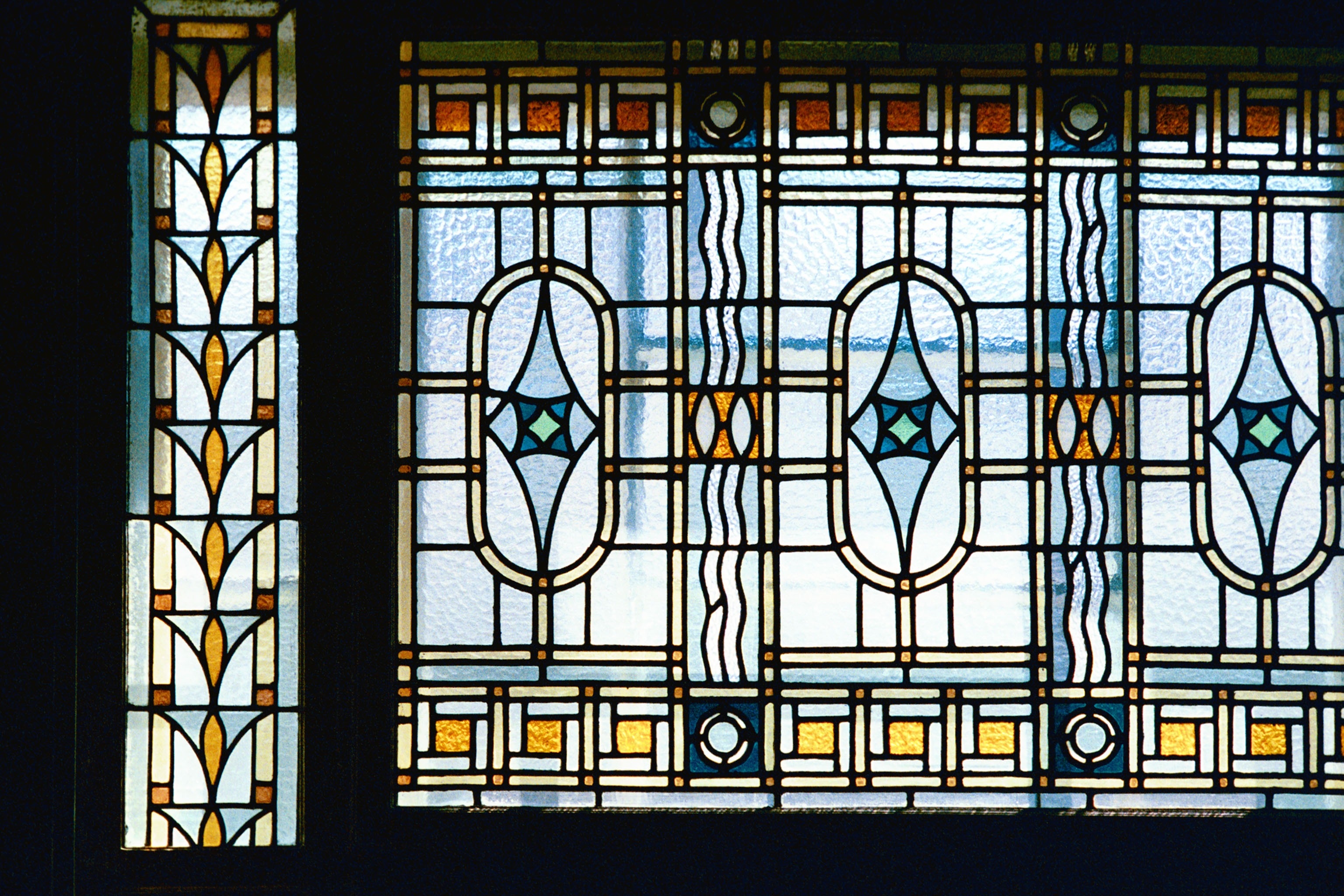 yellow blue and red tiffany window panel