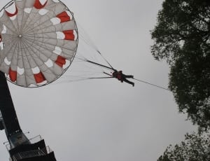 white and red parachute thumbnail