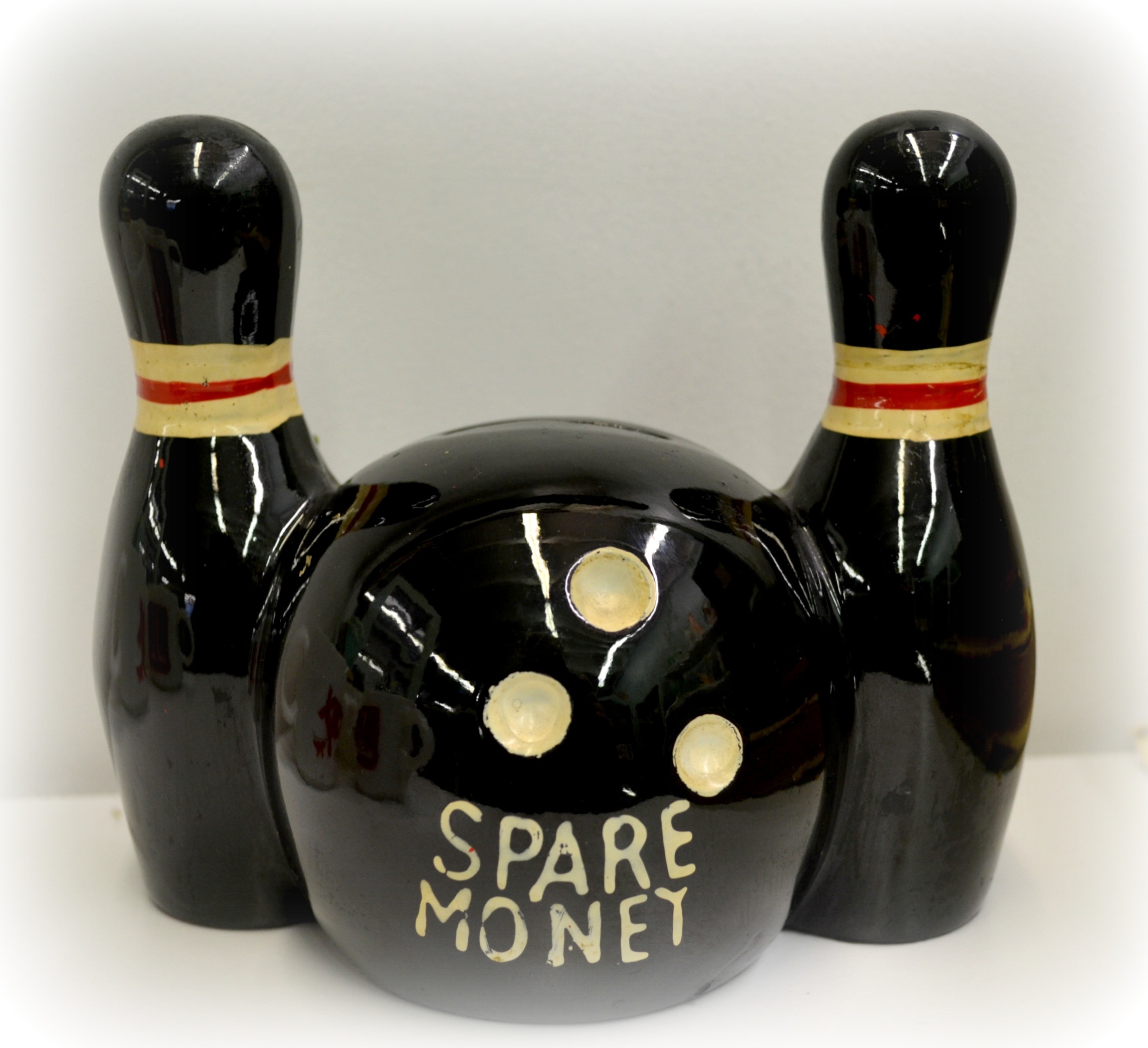 black spare money bowling set ceramic figurine
