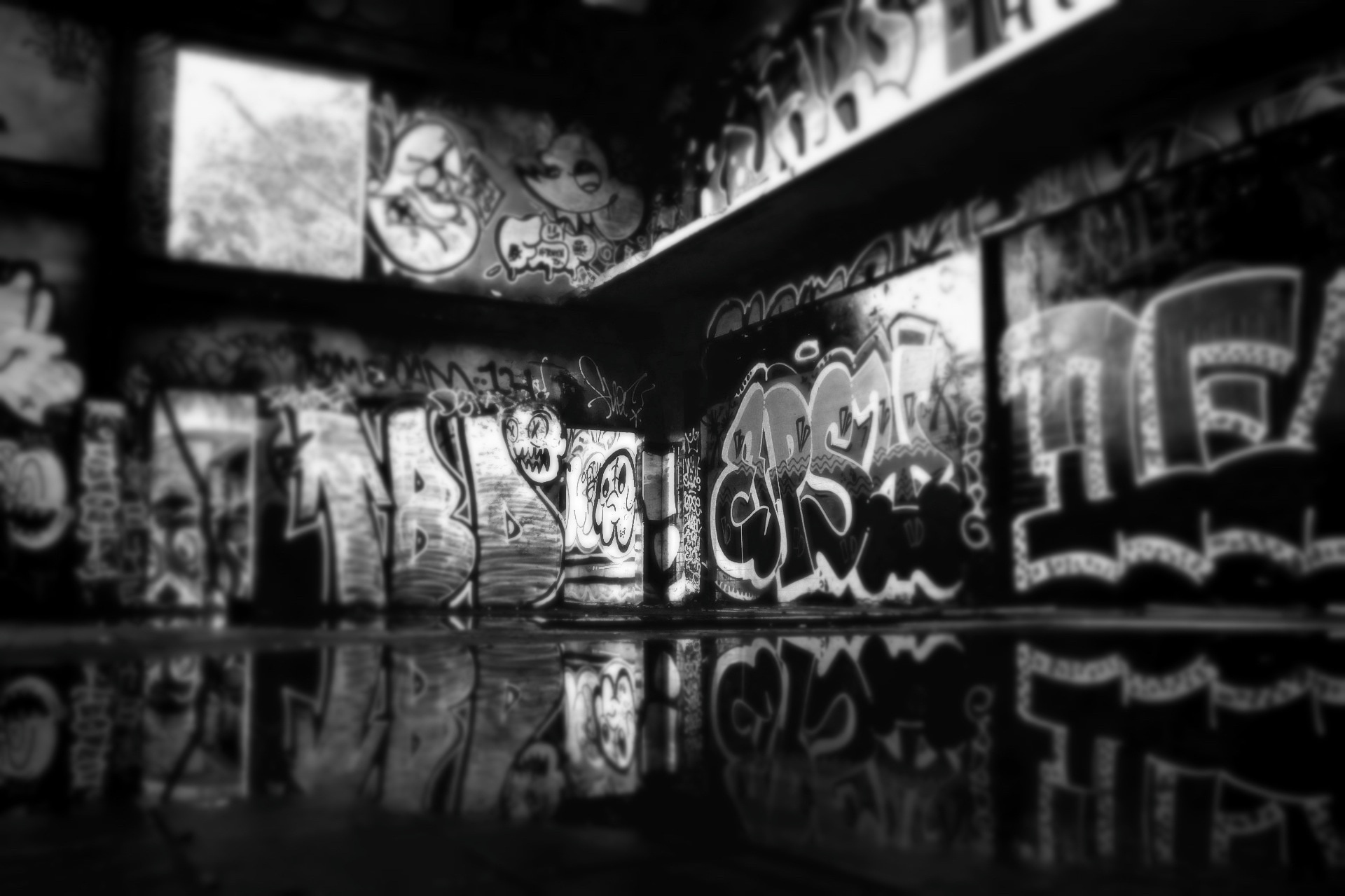 grayscale photo of graffiti
