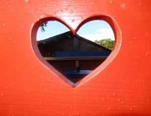 red wooden heart shape cut out decor thumbnail