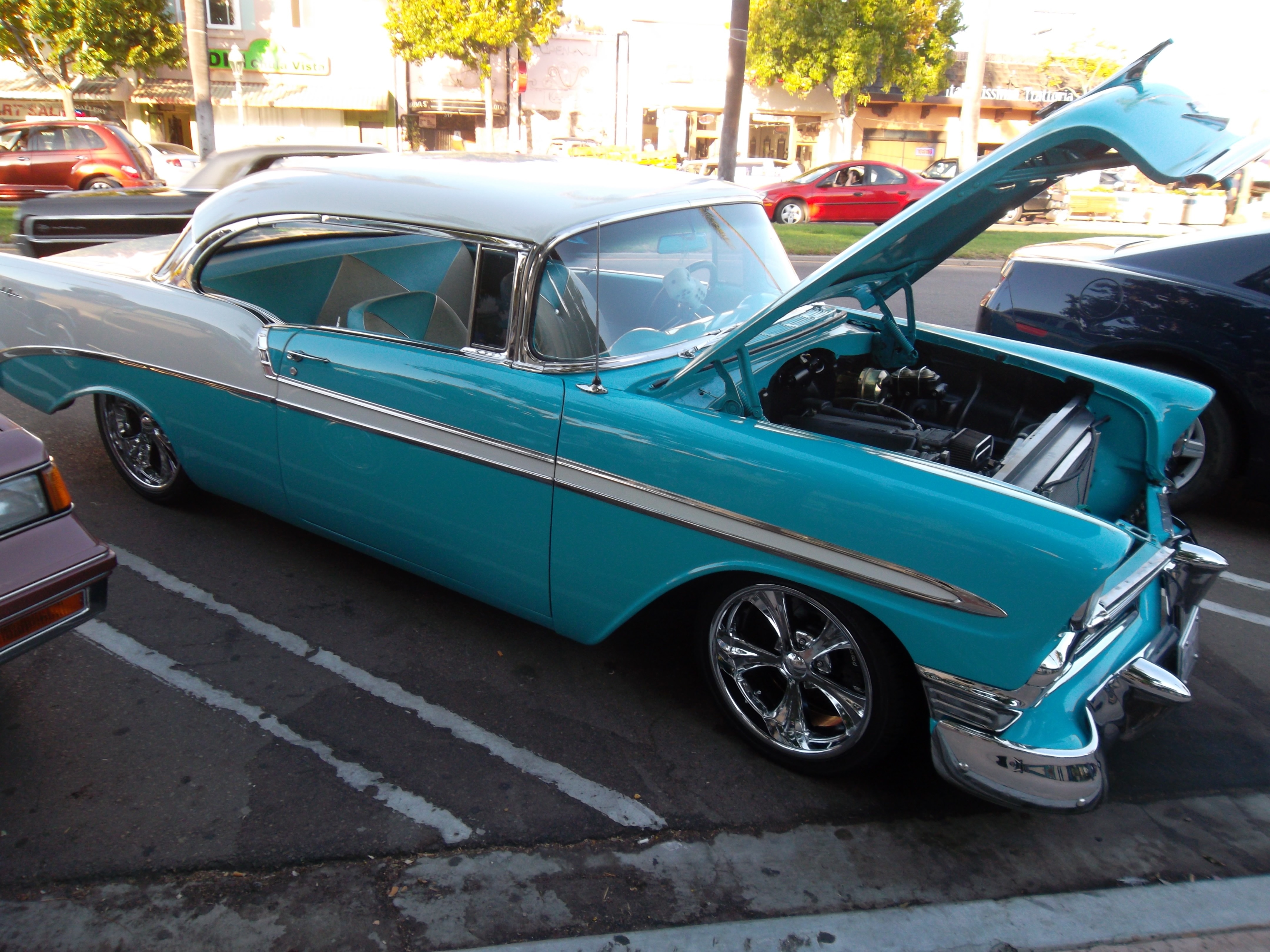white and teal chevrolet bel-air