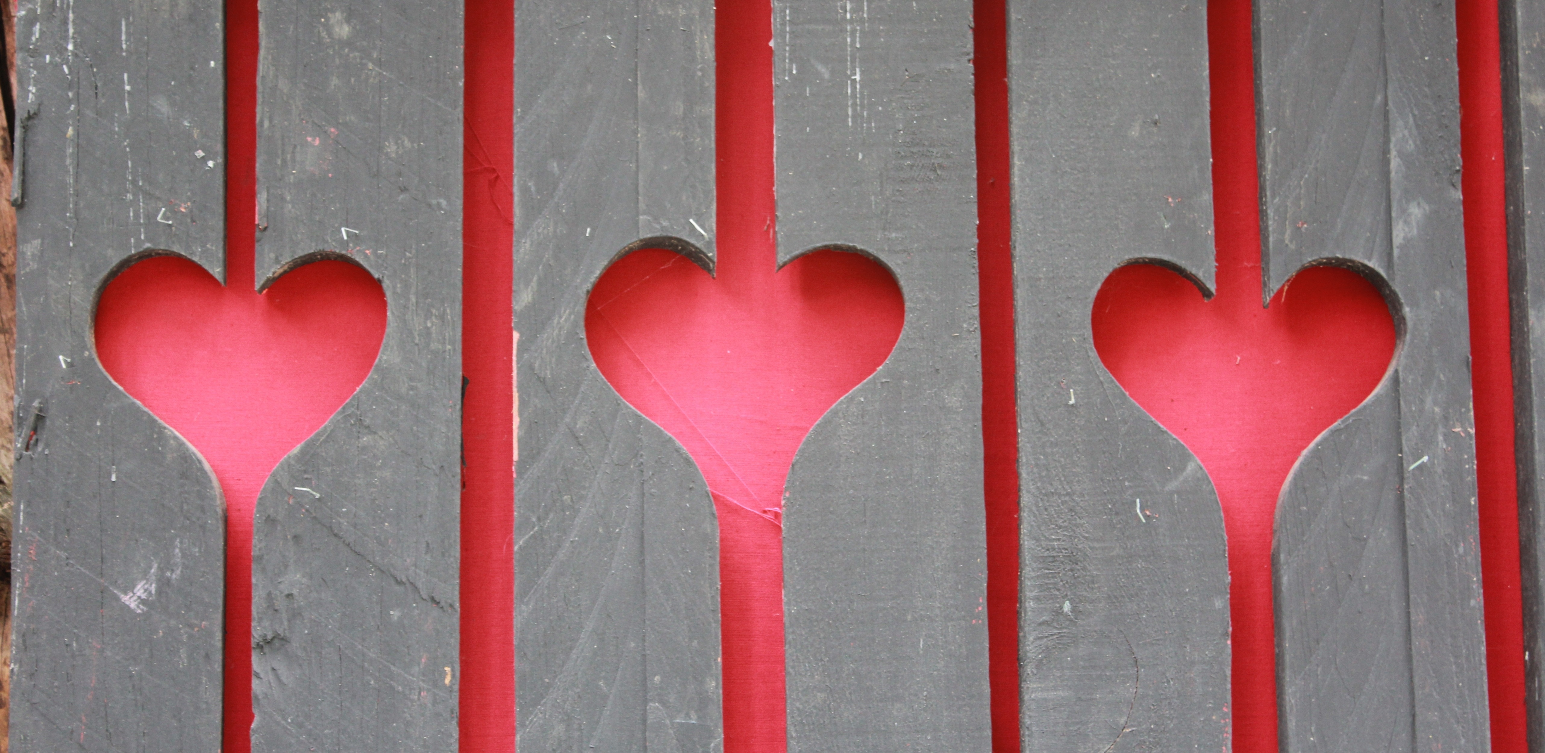 brown wooden heart carve fence