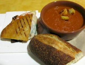 slice bread near brown ceramic bowl with sauce and pie thumbnail