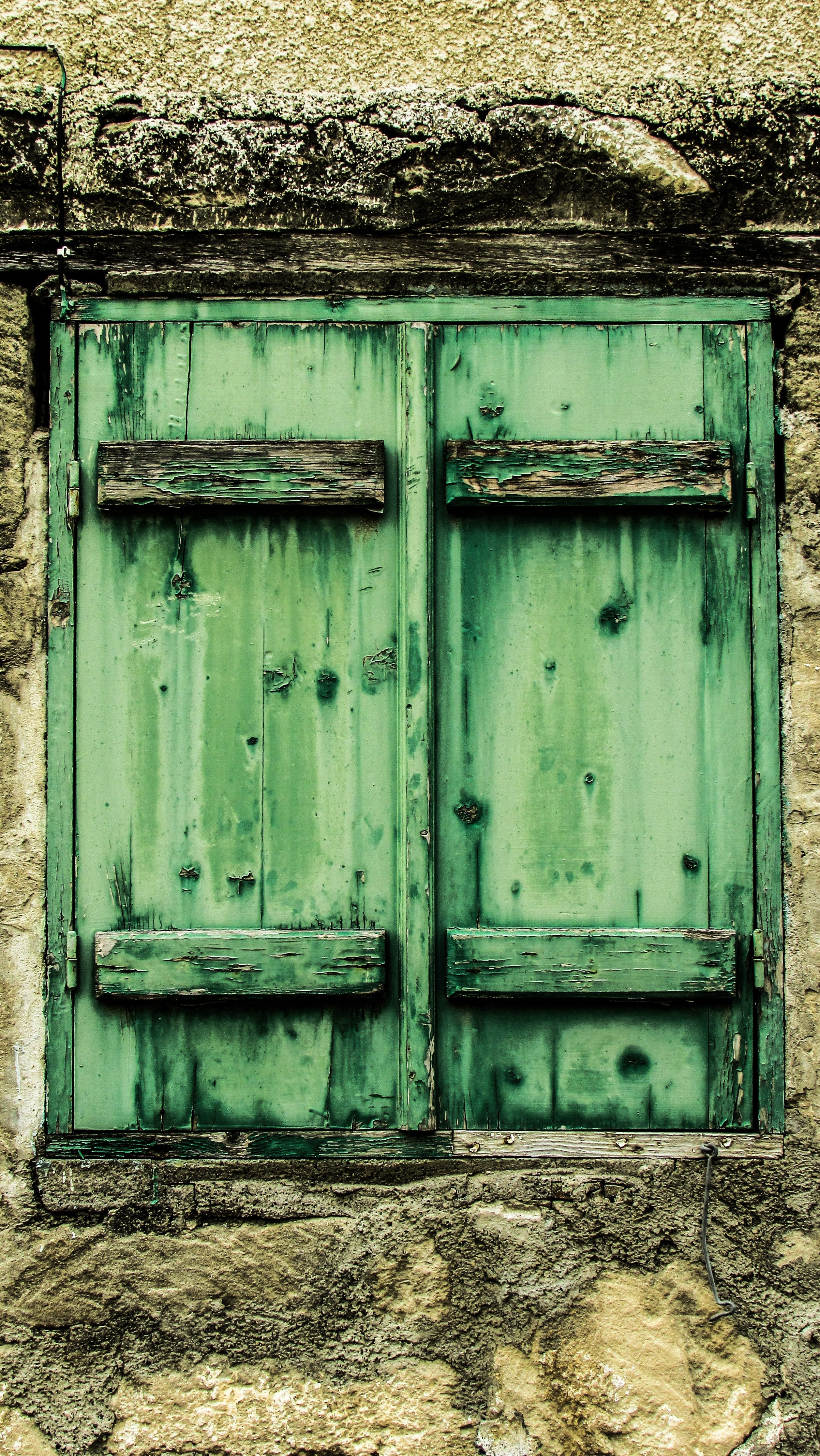 green wooden window